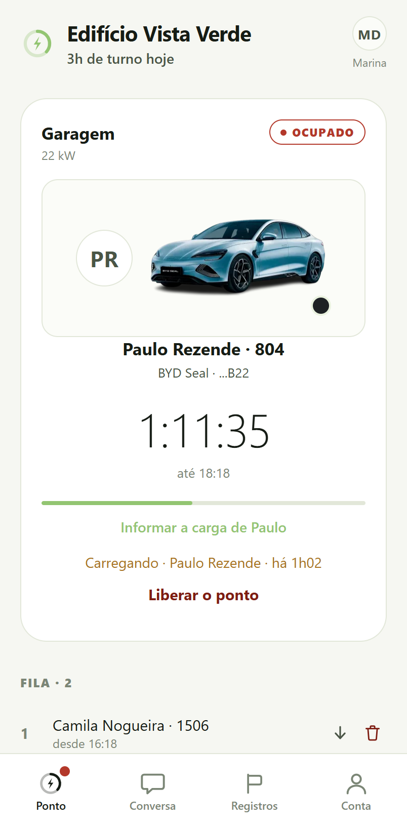 Tela do ponto de recarga: o carro de Paulo Rezende carregando na Garagem, com cronômetro e horário de saída.